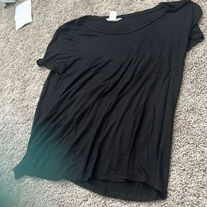 Loose solid black shirt
